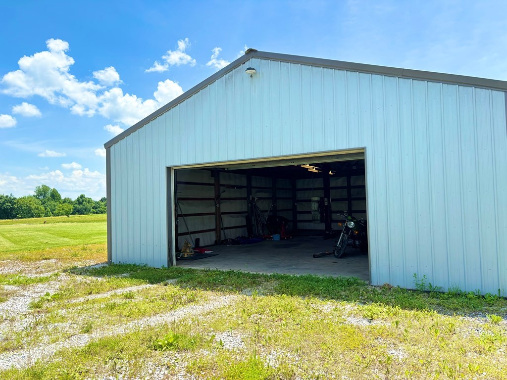 545 Adams Store Poole Mill Road Crofton, KY 42217 - Photo 45 of 48 a view of a house with a backyard