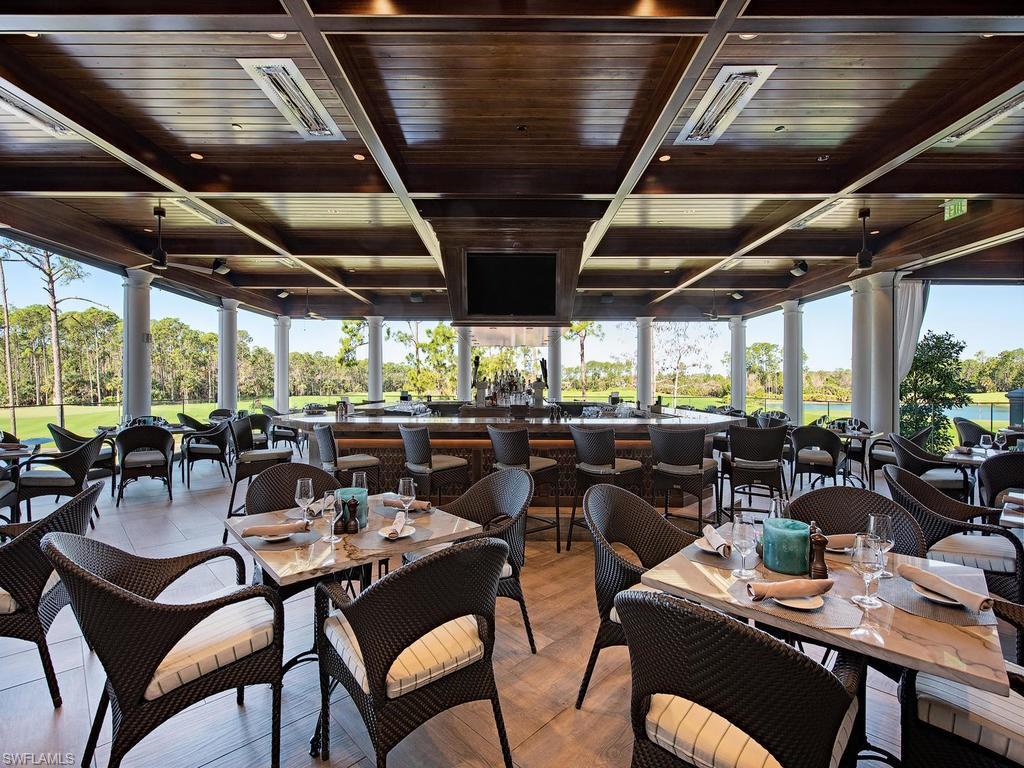 18081 Lagos Way Naples, FL 34110 - Photo 19 of 23 an outdoor space with lots of tables and chairs