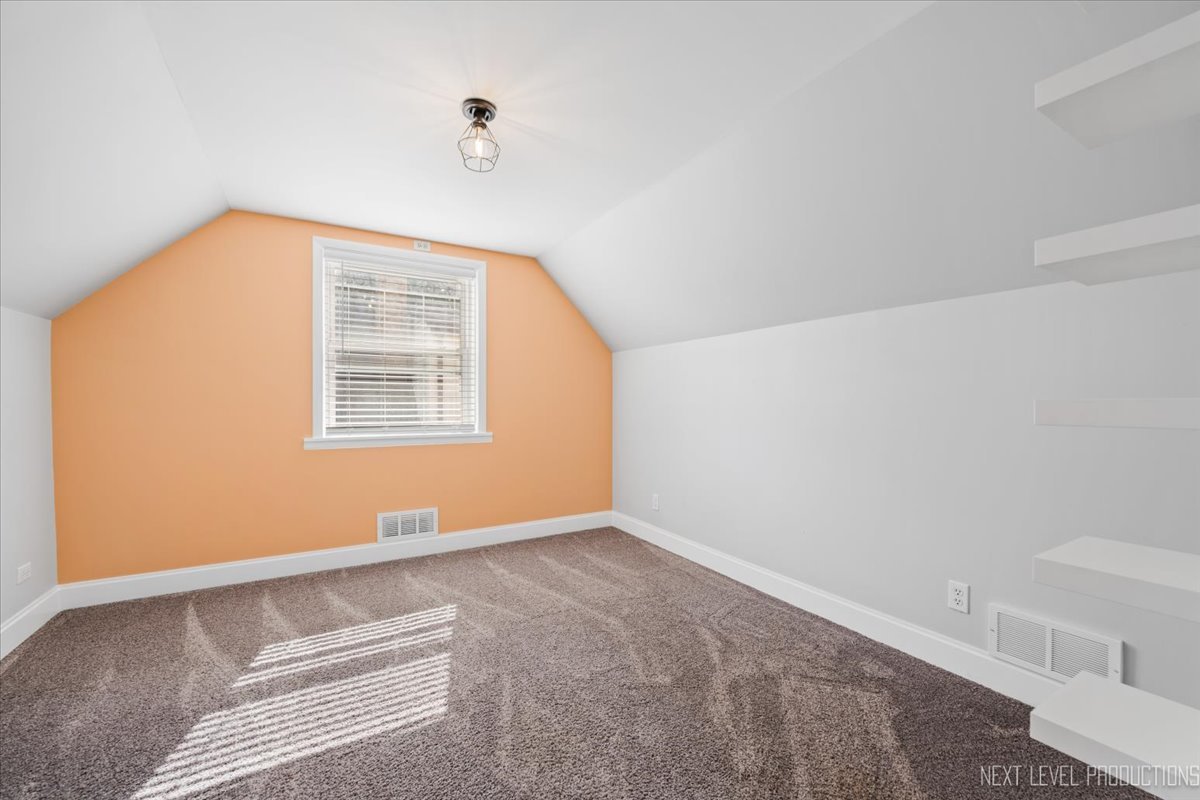 2440 South 20th Avenue Broadview, IL 60155 - Photo 15 of 24 a view of an empty room with a window