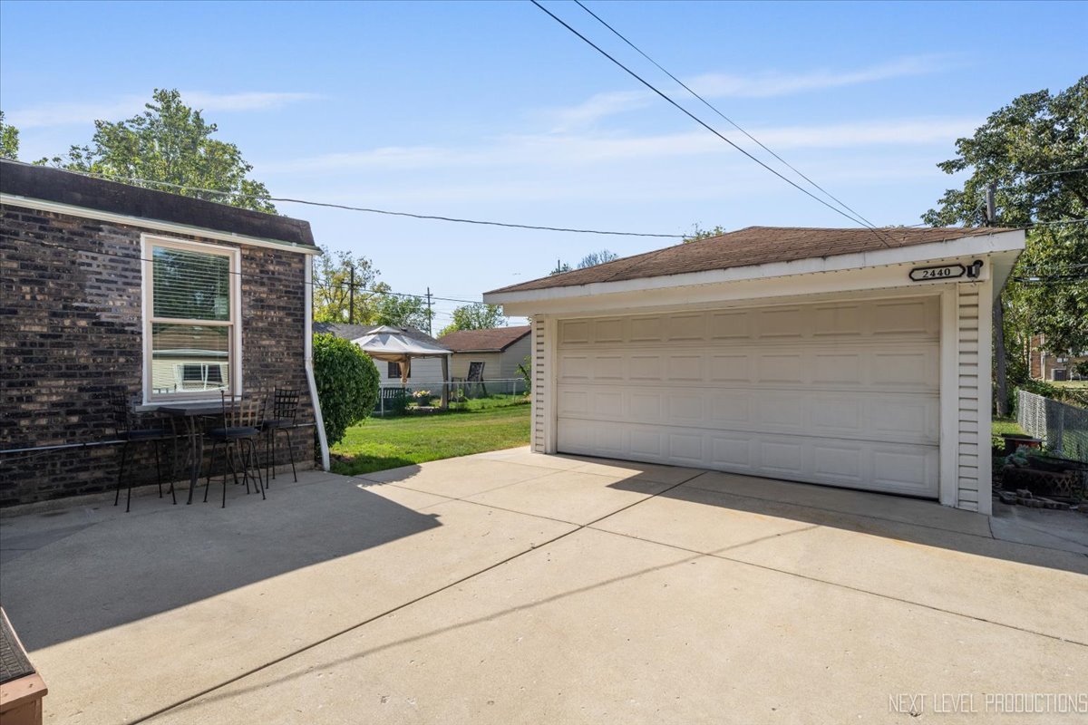 2440 South 20th Avenue Broadview, IL 60155 - Photo 19 of 24 a view of backyard with a garden and chair