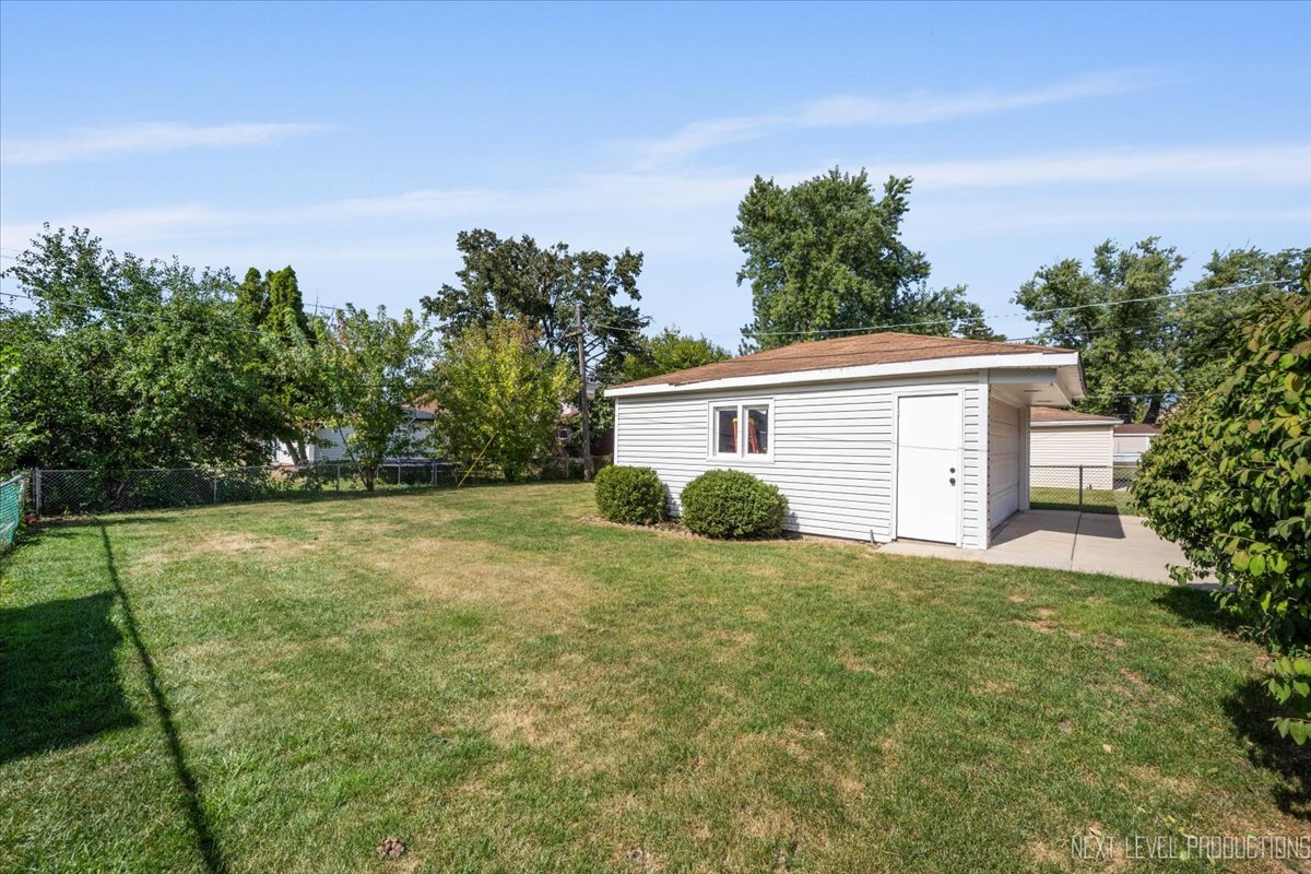 2440 South 20th Avenue Broadview, IL 60155 - Photo 21 of 24 a view of a house with a yard