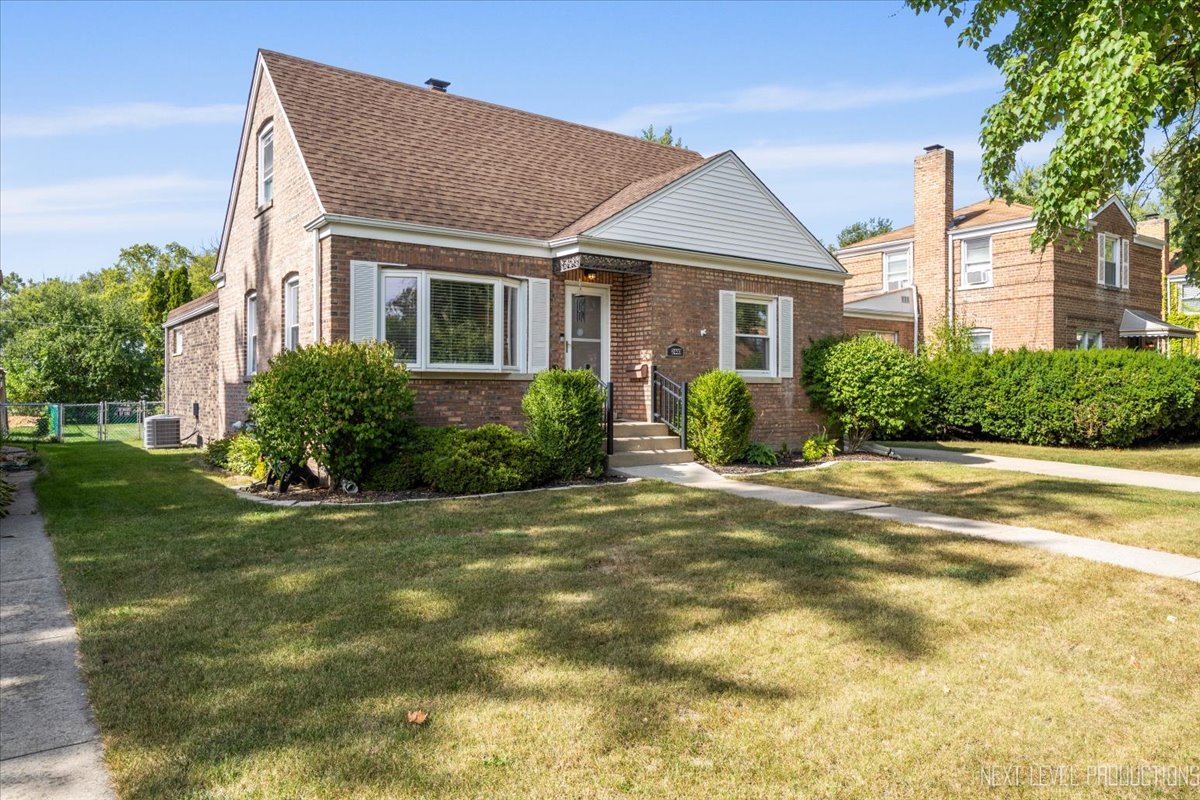 2440 South 20th Avenue Broadview, IL 60155 - Photo 24 of 24 a view of a house next to a yard
