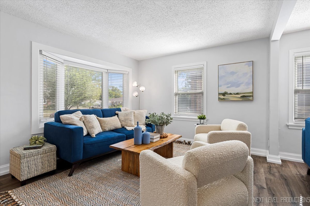 2440 South 20th Avenue Broadview, IL 60155 - Photo 3 of 24 a living room with furniture and a large window