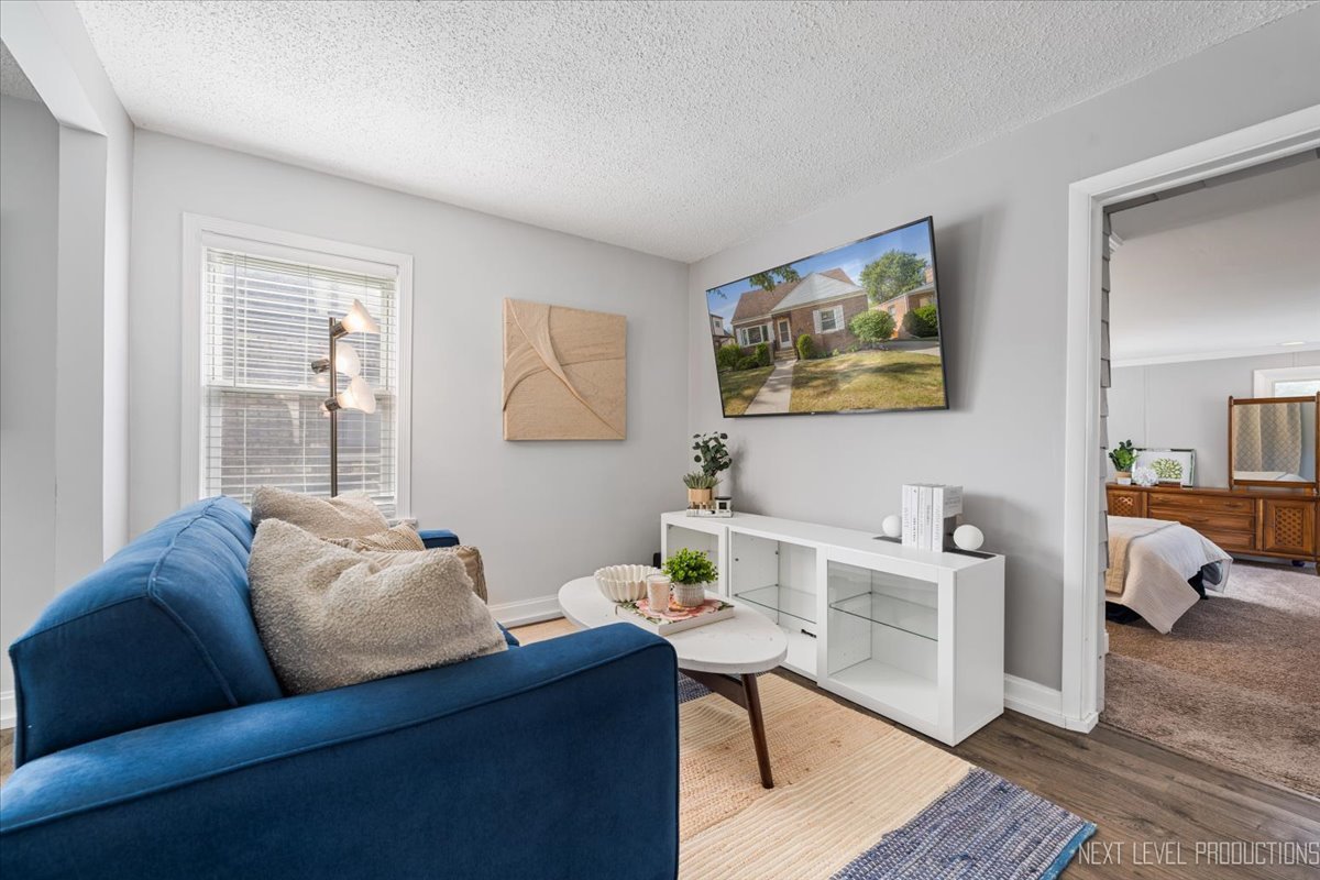 2440 South 20th Avenue Broadview, IL 60155 - Photo 5 of 24 a living room with furniture and a window