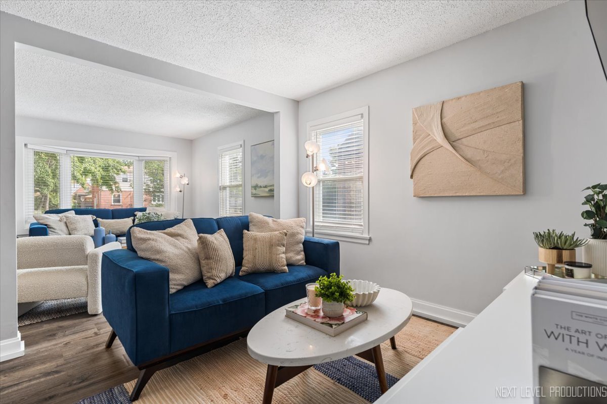 2440 South 20th Avenue Broadview, IL 60155 - Photo 8 of 24 a living room with furniture and a wooden floor
