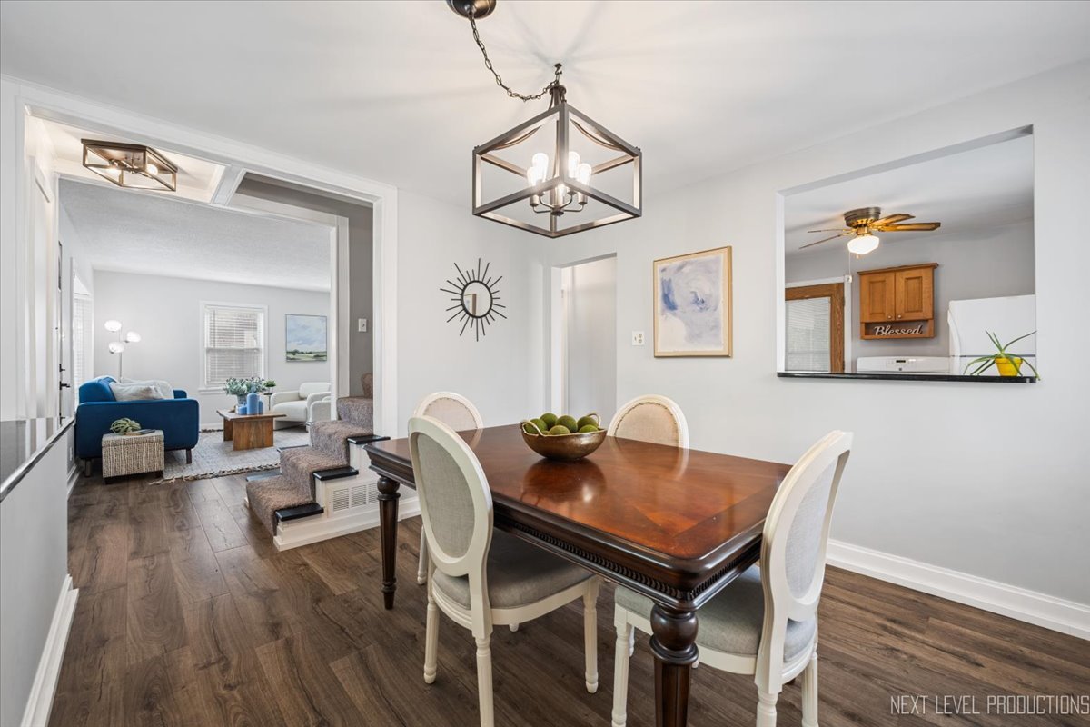 2440 South 20th Avenue Broadview, IL 60155 - Photo 10 of 24 a view of a dining room with furniture and wooden floor