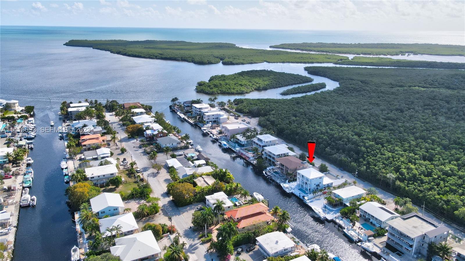 48 Andros Road Key Largo, FL 33037 - Photo 12 of 60 a view of a lake with outdoor space