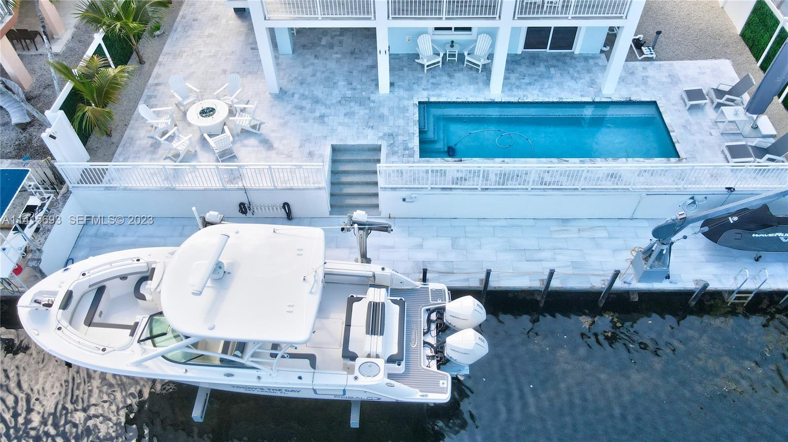 48 Andros Road Key Largo, FL 33037 - Photo 15 of 60 an aerial view of residential houses with outdoor space