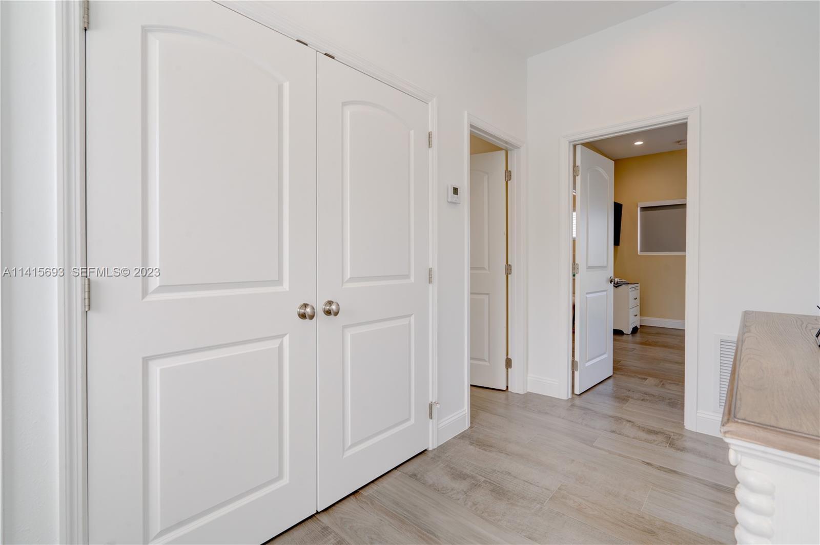 48 Andros Road Key Largo, FL 33037 - Photo 47 of 60 a view of an empty room with wooden floor
