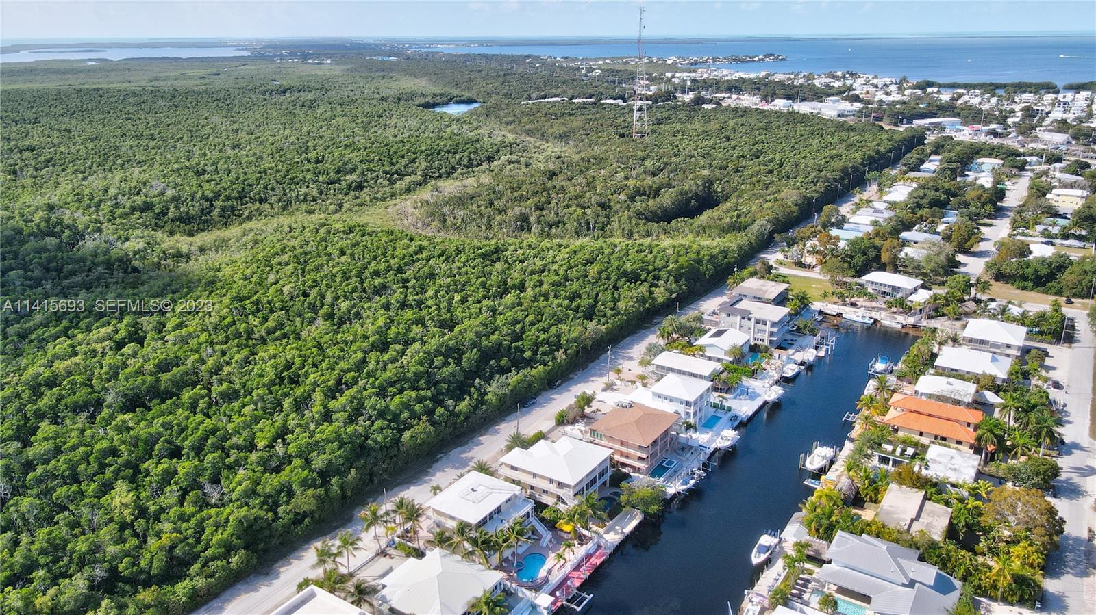 48 Andros Road Key Largo, FL 33037 - Photo 9 of 60 an aerial view of a city