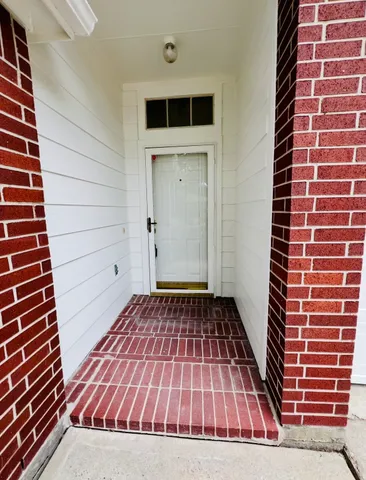 a view of wooden floor in a bathroom