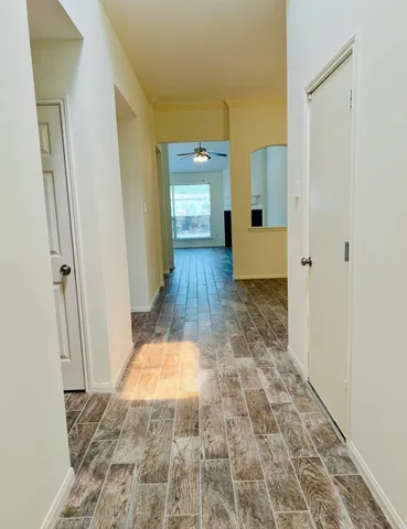 a bathroom with a vanity and a mirror