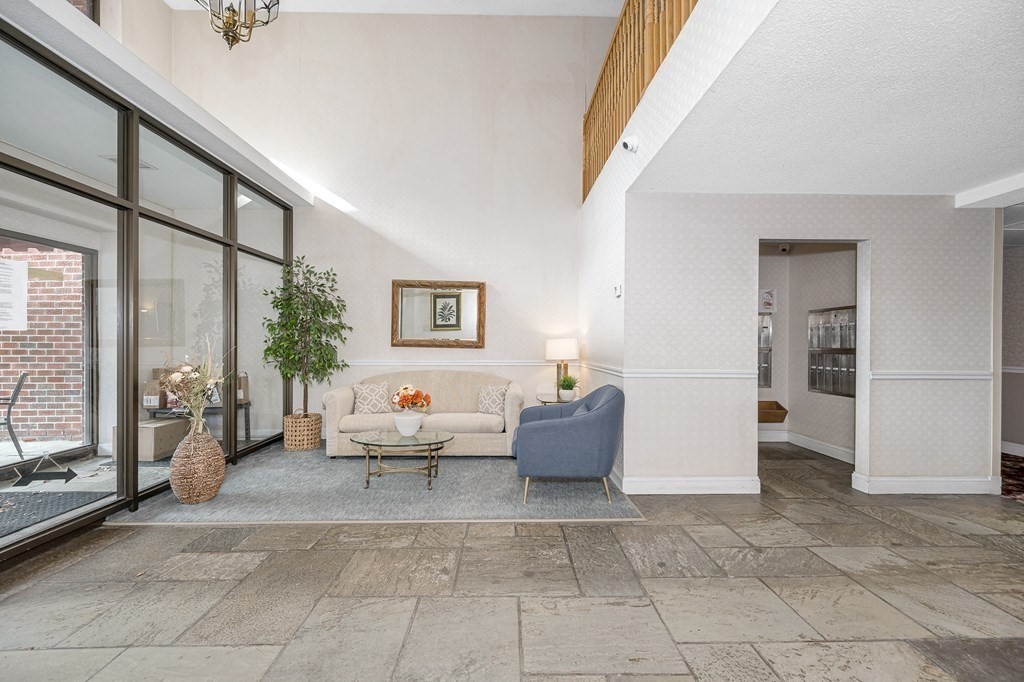 3 Summit Drive, Unit 16 Reading, MA 01867 - Photo 18 of 21 a living room with furniture