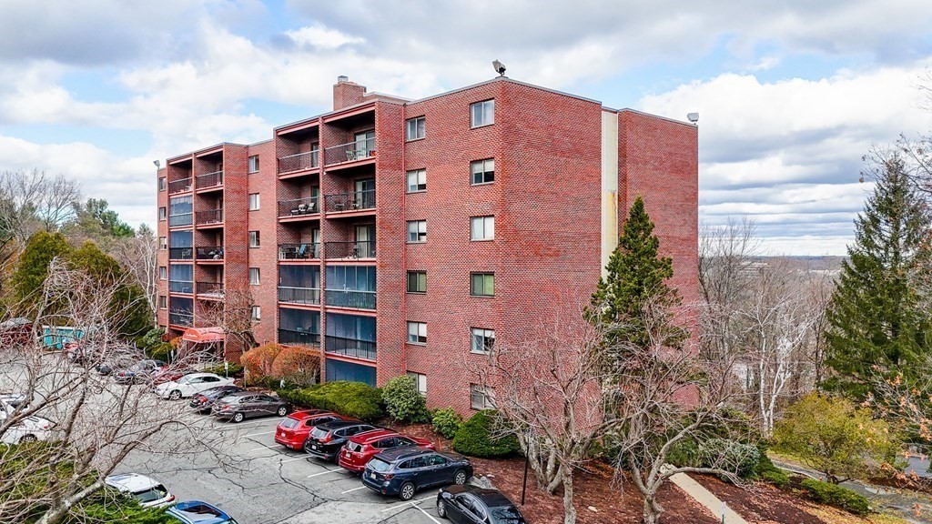 3 Summit Drive, Unit 16 Reading, MA 01867 - Photo 3 of 21 a front view of a building