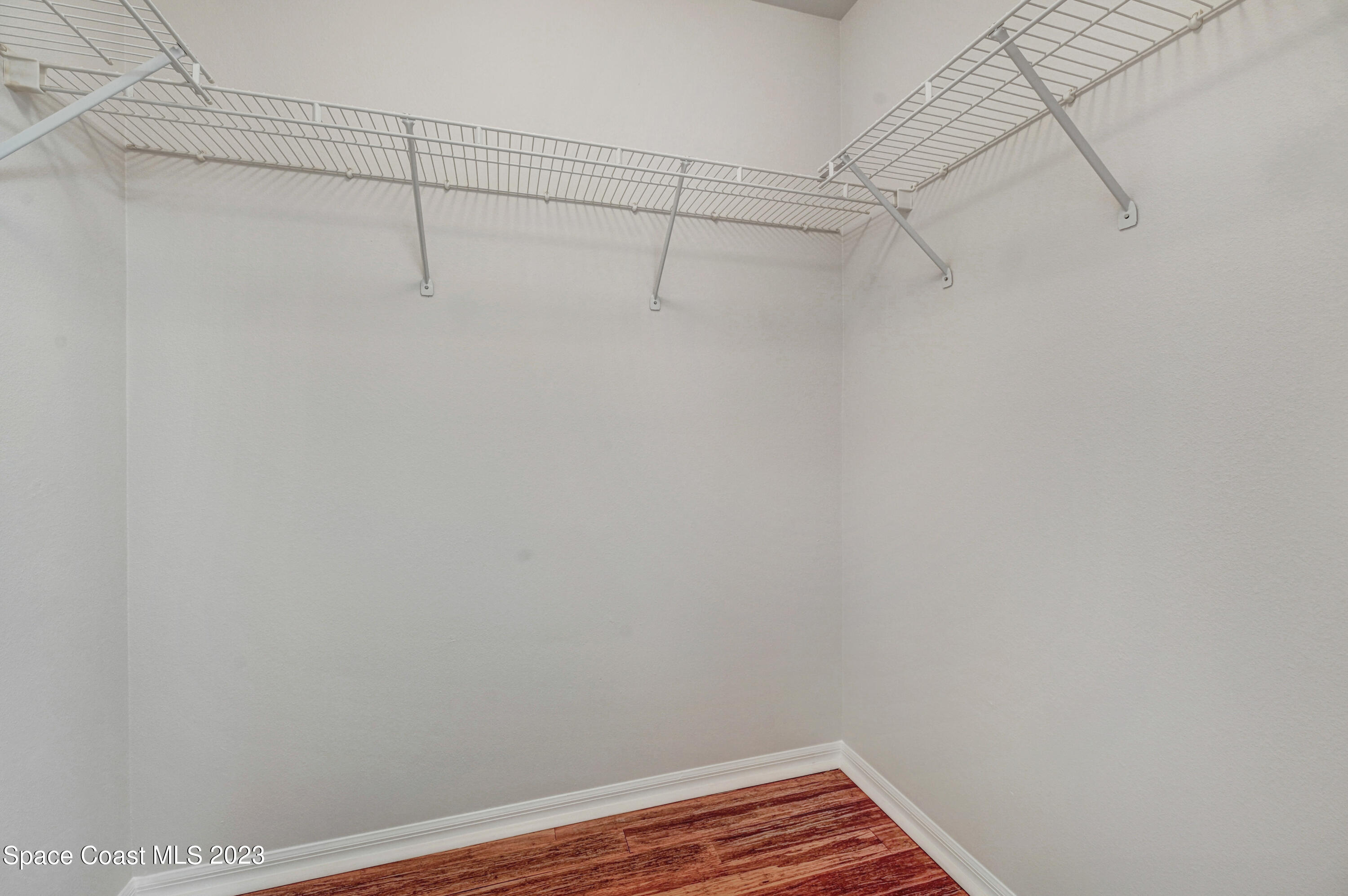 2070 Redwood Circle Palm Bay, FL 32905 - Photo 16 of 33 a view of a room with racks on the wall