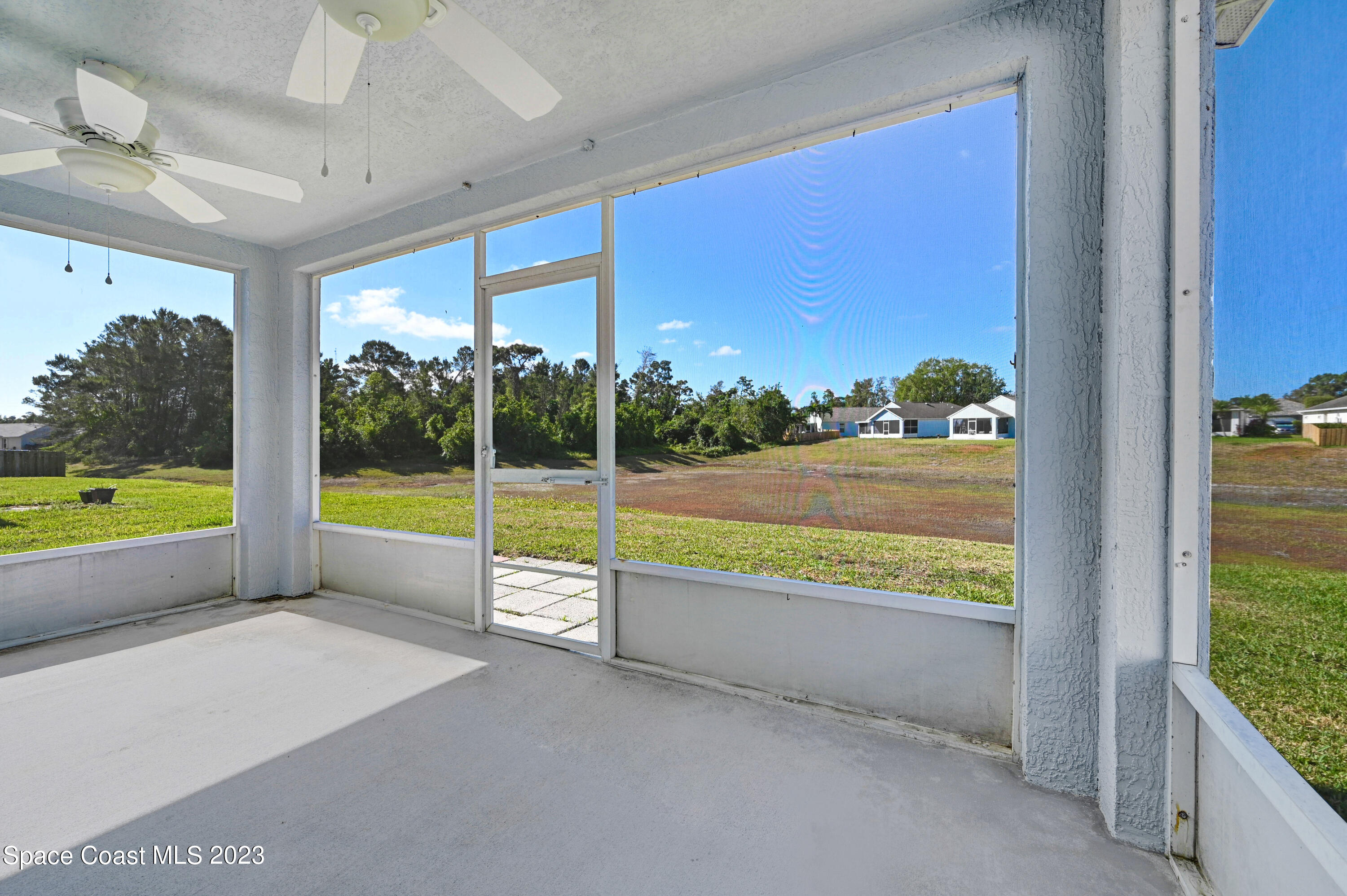 2070 Redwood Circle Palm Bay, FL 32905 - Photo 23 of 33 a view of a swimming pool and outdoor space