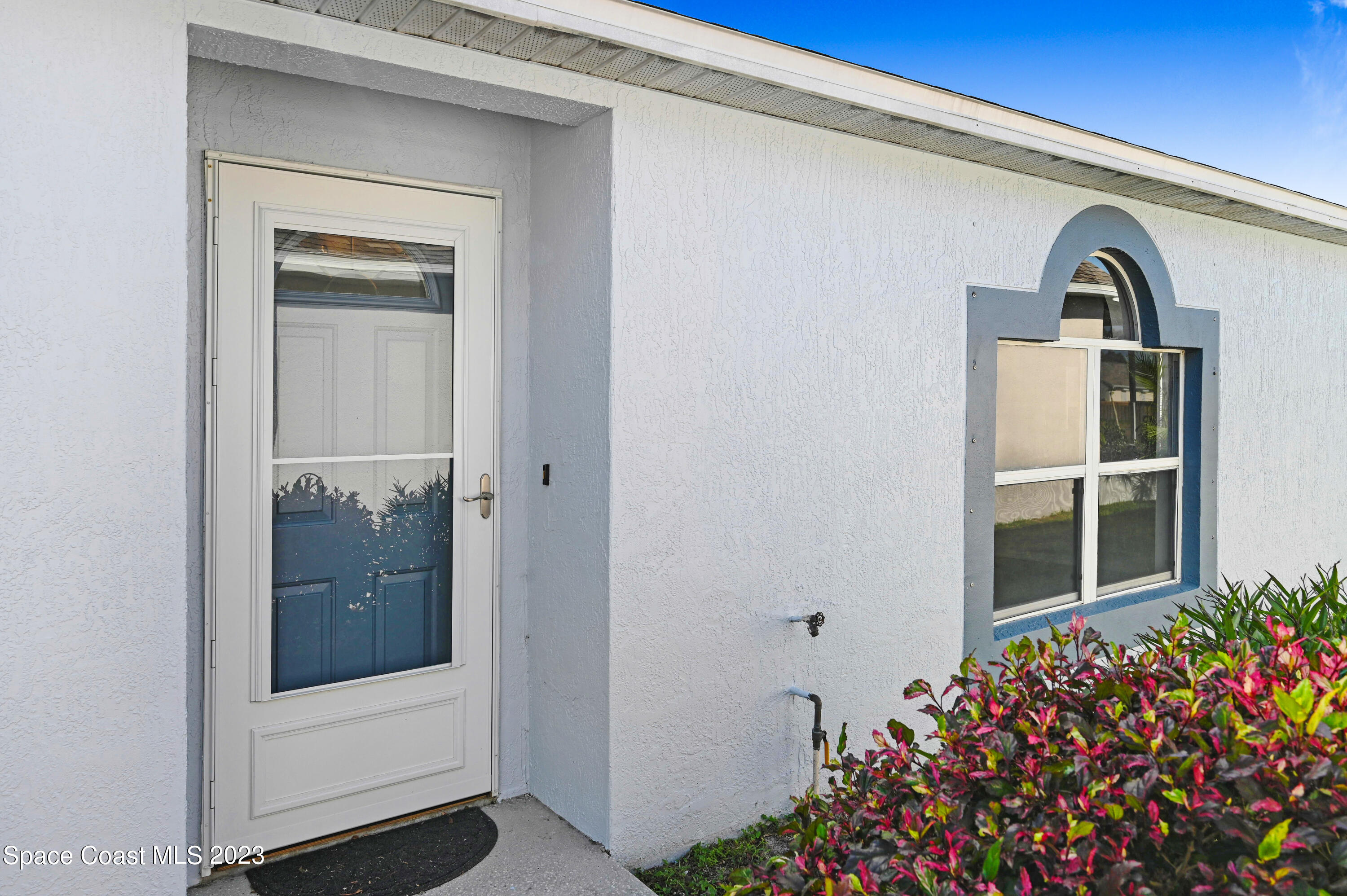 2070 Redwood Circle Palm Bay, FL 32905 - Photo 26 of 33 a view of front door and a wooden door
