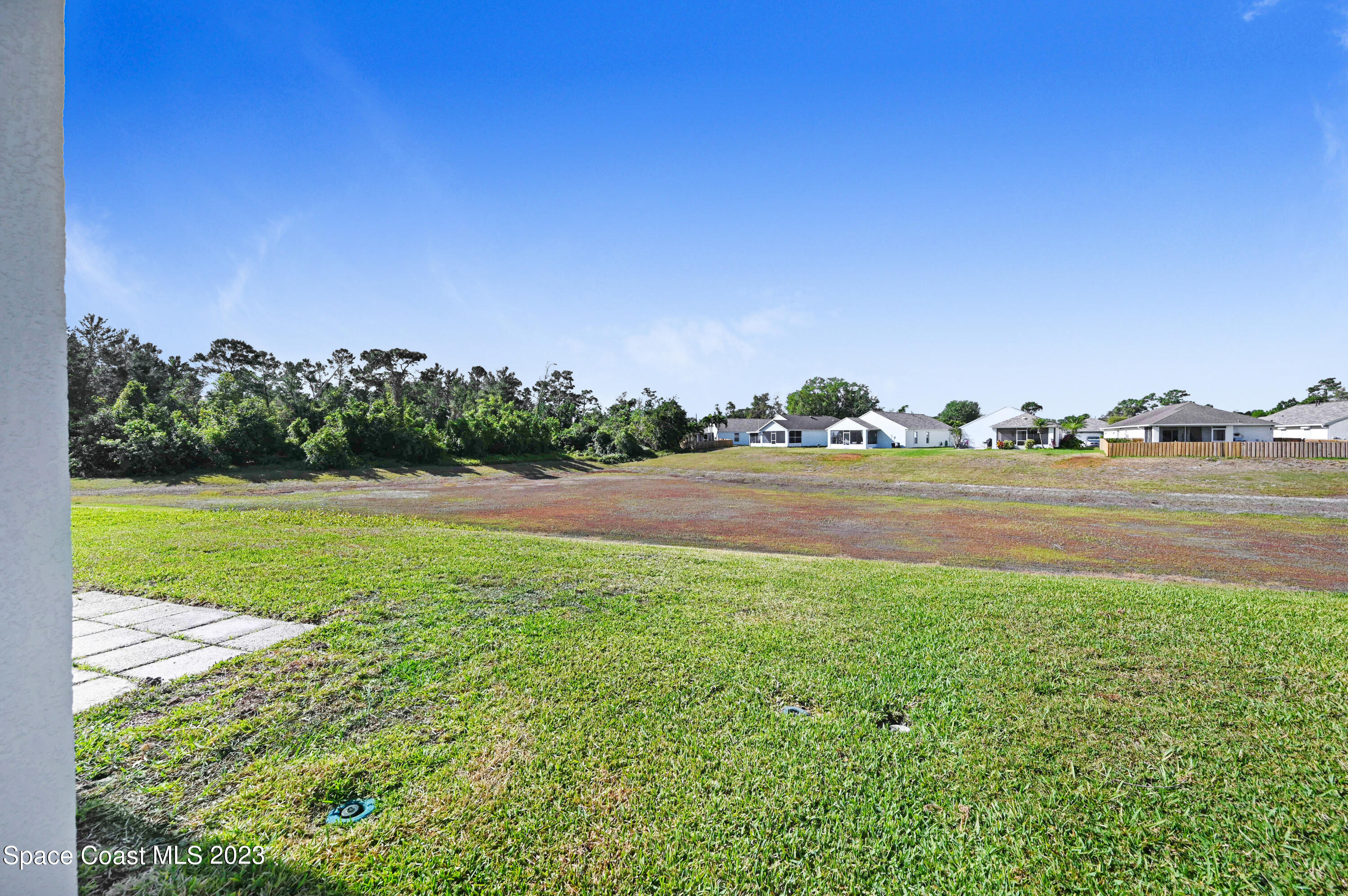 2070 Redwood Circle Palm Bay, FL 32905 - Photo 30 of 33 a view of a lake and yard