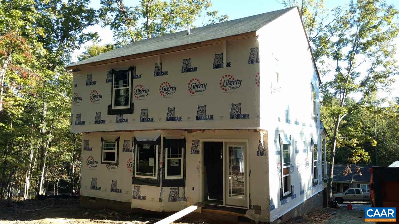 18 Ashton Road Palmyra, VA 22963 - Photo 3 of 33 a front view of a building with entryway