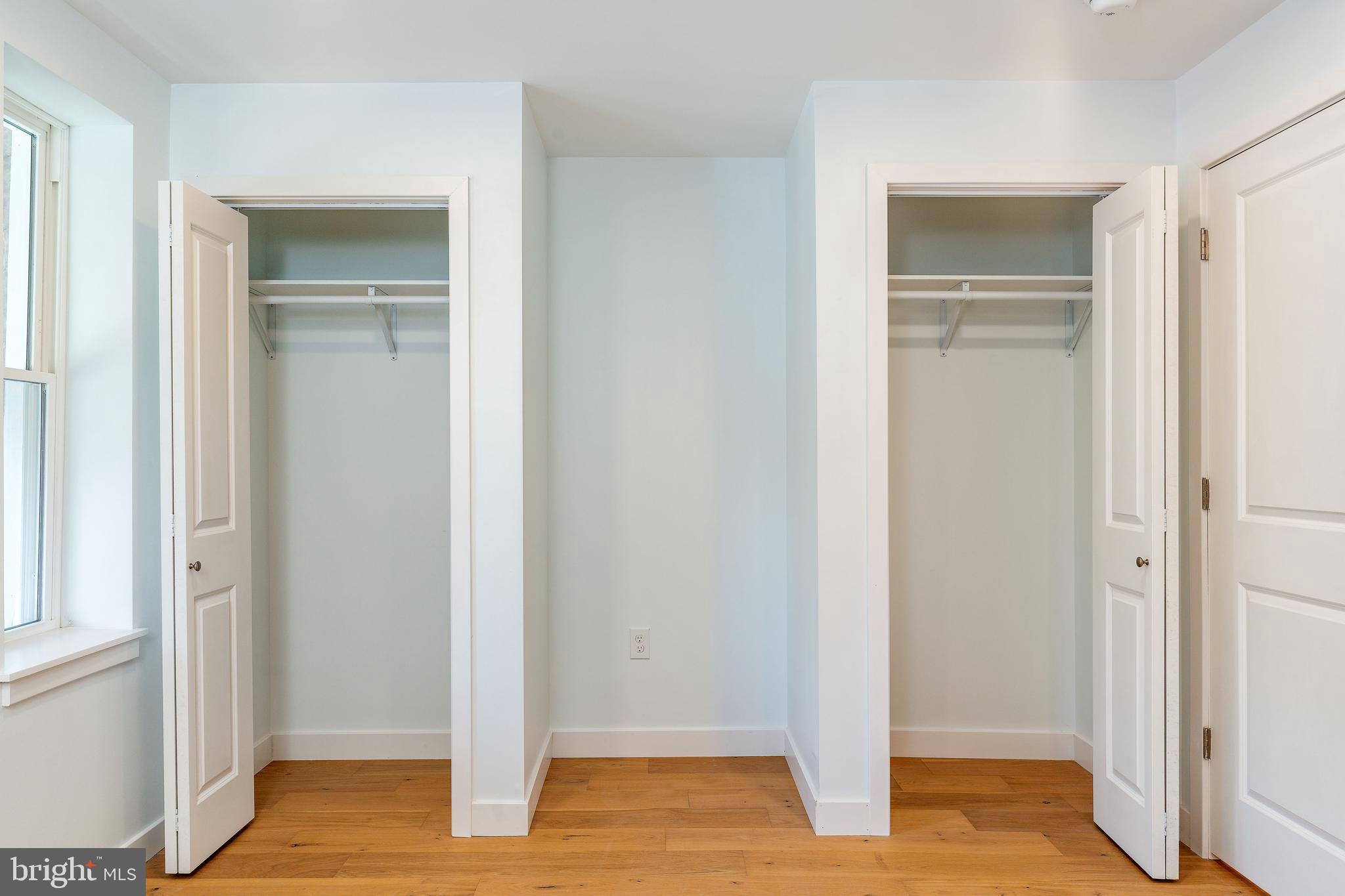 3016 South 17th Street Philadelphia, PA 19145 - Photo 19 of 30 a view of an empty room with closet and wooden floor