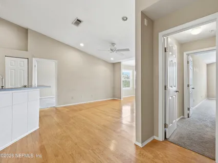 a view of an empty room with a window