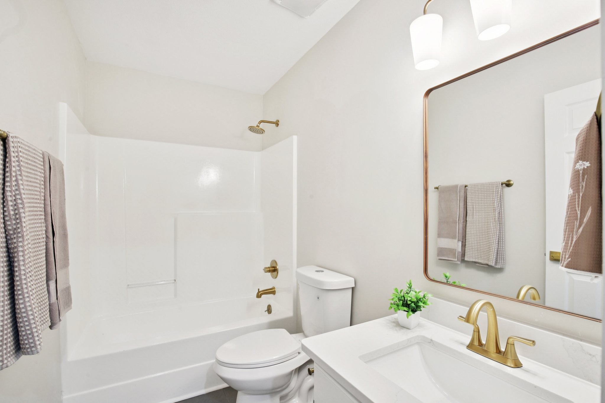 1698 Porter Road Bon Aqua, TN 37025 - Photo 12 of 24 a bathroom with a sink toilet and shower