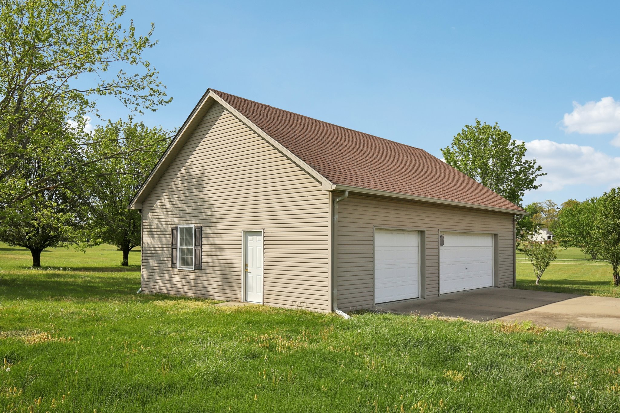 1698 Porter Road Bon Aqua, TN 37025 - Photo 20 of 24 a view of a house with a yard