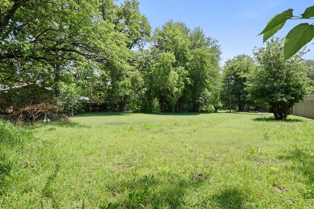 602 Wes Michael Road Bonham, TX 75418 - Photo 15 of 16 a view of outdoor space with deck and yard