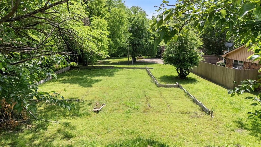 602 Wes Michael Road Bonham, TX 75418 - Photo 2 of 16 a view of swimming pool with a yard