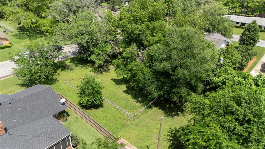 602 Wes Michael Road Bonham, TX 75418 - Photo 6 of 16 an aerial view of residential house with outdoor space and trees all around