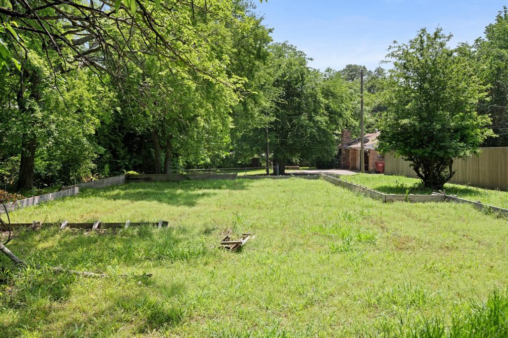 602 Wes Michael Road Bonham, TX 75418 - Photo 7 of 16 a swimming pool with trees in the background