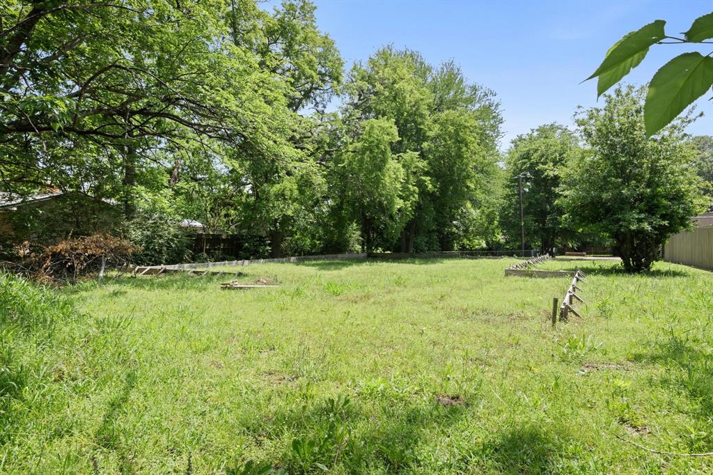 602 Wes Michael Road Bonham, TX 75418 - Photo 8 of 16 a view of outdoor space with deck and yard