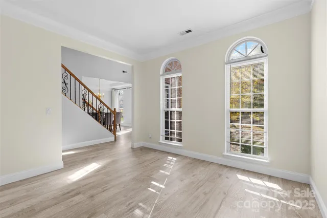 a spacious bathroom with a granite countertop sink a mirror and a