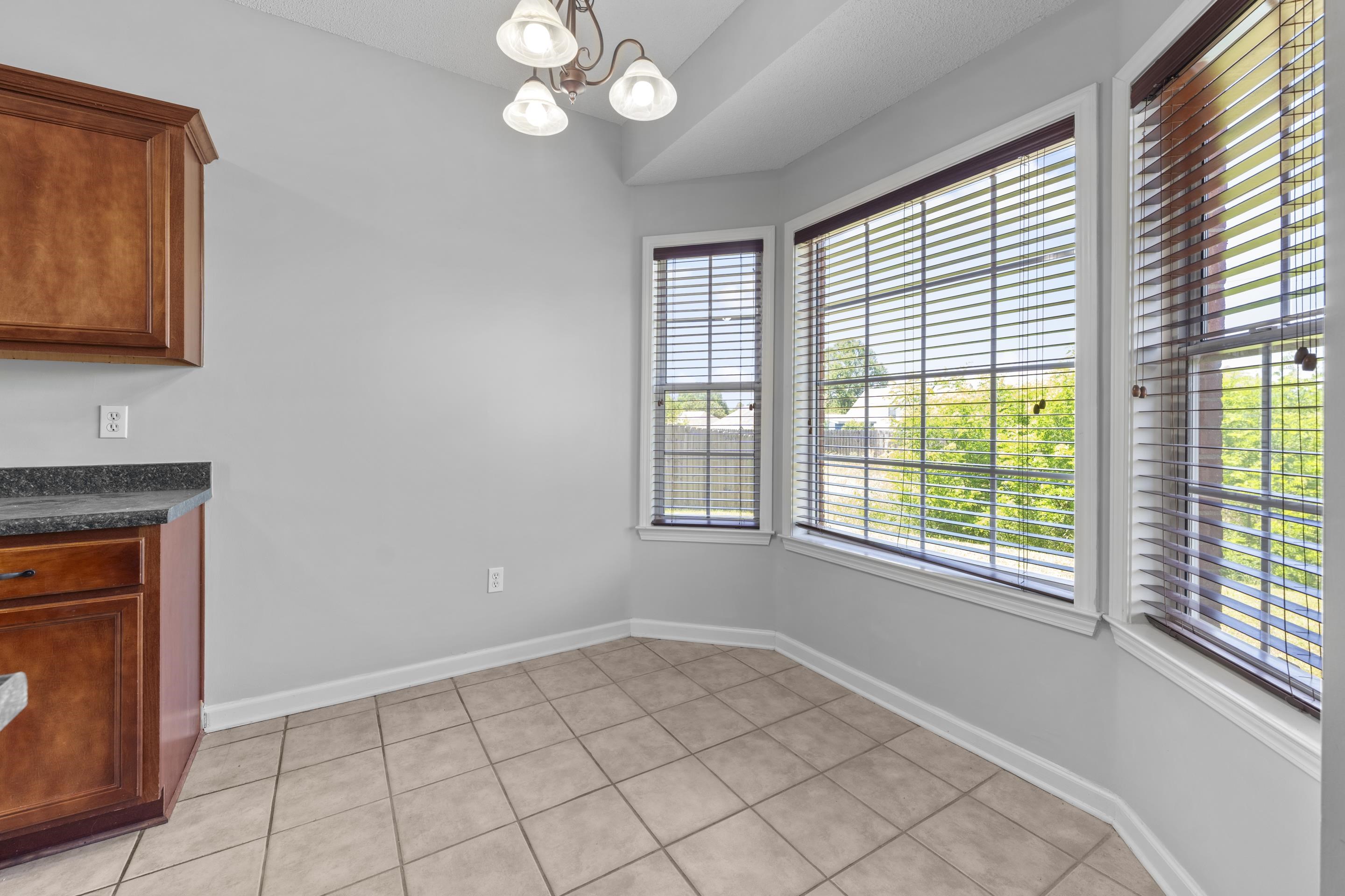50 Abbey Road Oakland, TN 38060 - Photo 10 of 26 Bay window with multiple large windows featuring horizontal blinds