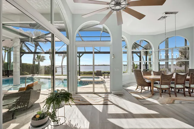 a spacious bathroom with double vanity and a mirror