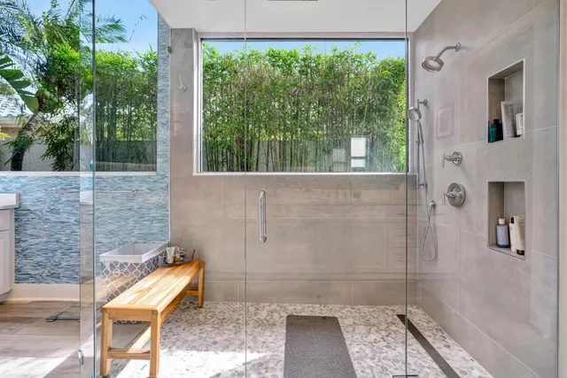 a view of swimming pool with seating area