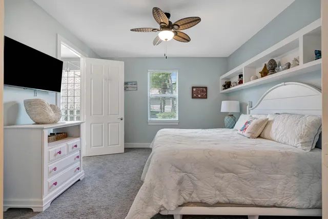 a aerial view of a house with a yard and plants