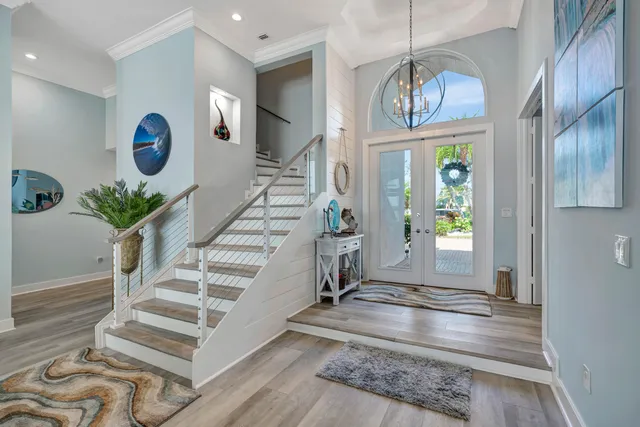 a living room with stainless steel appliances kitchen island granite countertop furniture and a kitchen view
