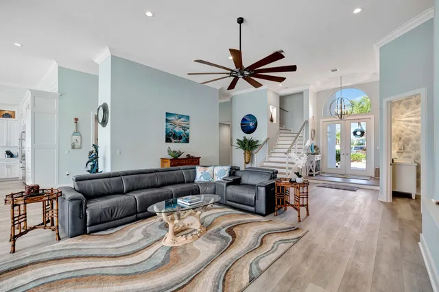 a kitchen with stainless steel appliances a stove a sink and a refrigerator