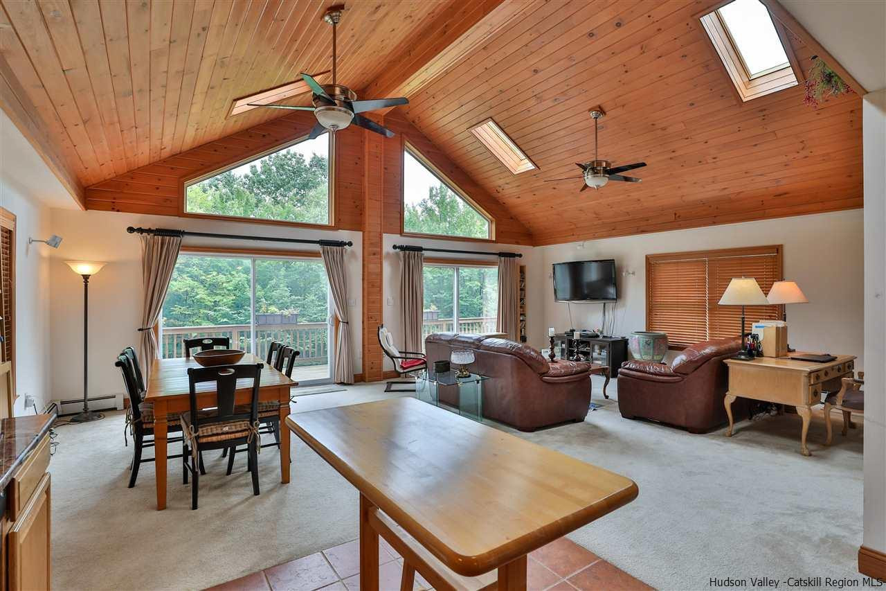 293 Barley Road Pine Hill, NY 12465 - Photo 14 of 25 a living room with furniture a large window and a table
