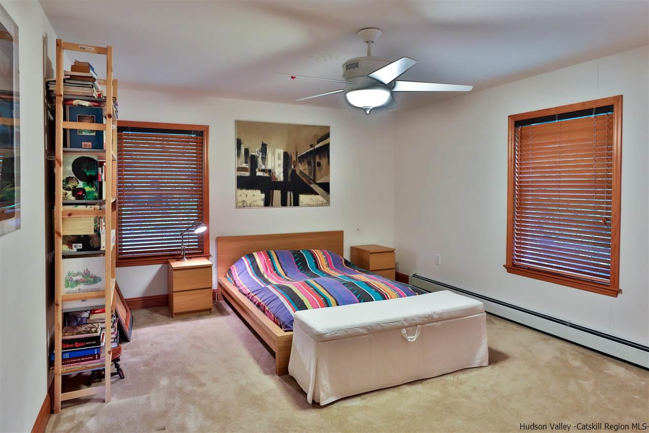 293 Barley Road Pine Hill, NY 12465 - Photo 19 of 25 a living room with furniture and wall paintings
