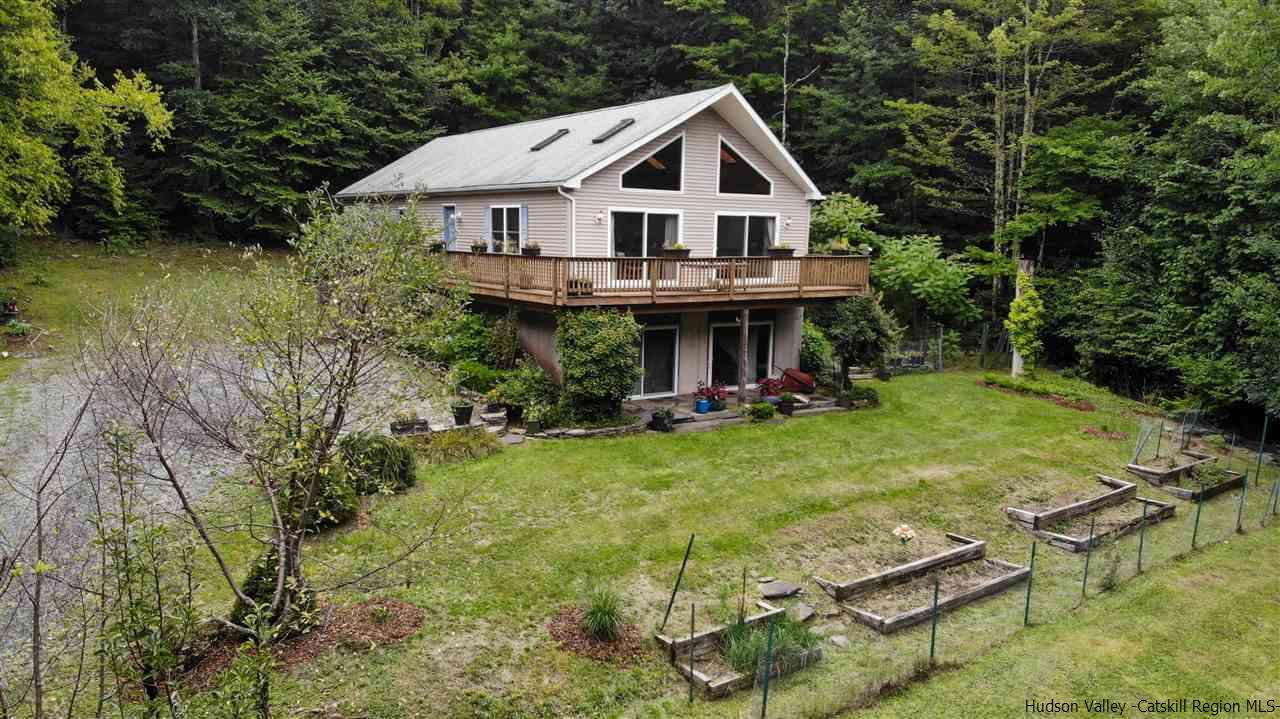 293 Barley Road Pine Hill, NY 12465 - Photo 2 of 25 a front view of a house with garden