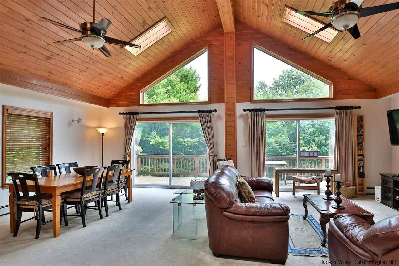 293 Barley Road Pine Hill, NY 12465 - Photo 10 of 25 a living room with furniture and a large window