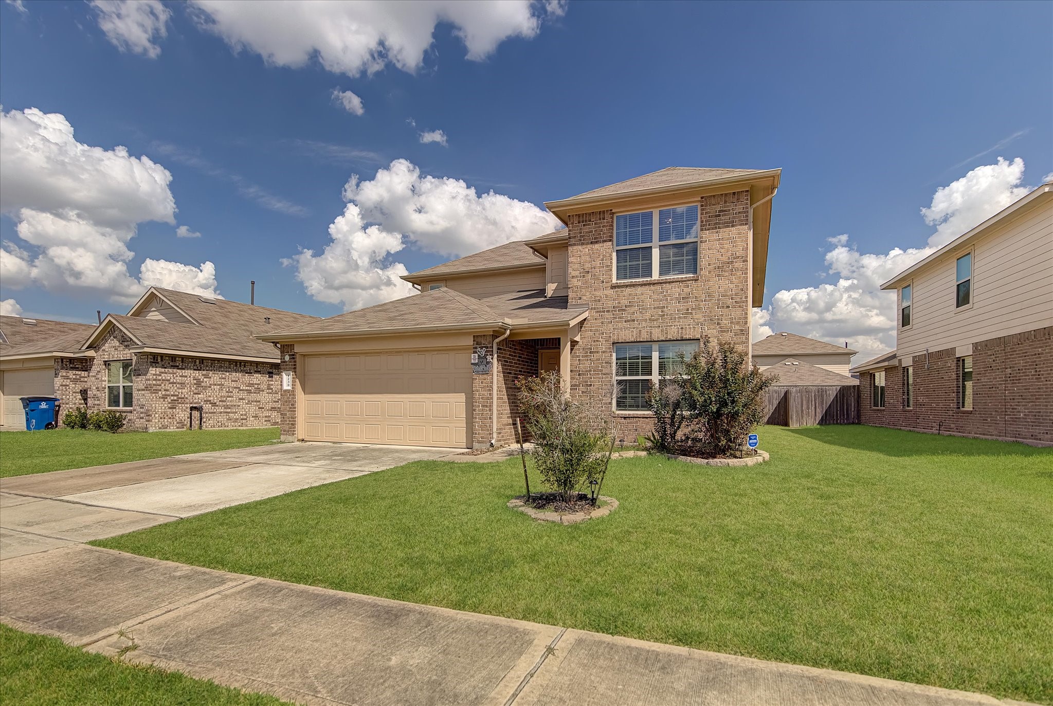 1230 Baja Vista Way Channelview, TX 77530 - Photo 1 of 33 a front view of a house with garden and porch