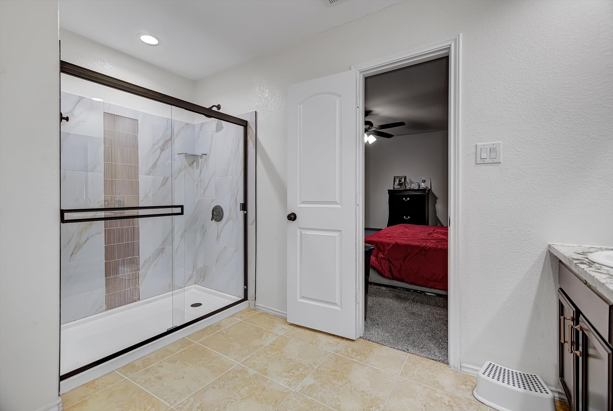 1230 Baja Vista Way Channelview, TX 77530 - Photo 19 of 33 a bathroom with a glass shower door and a sink