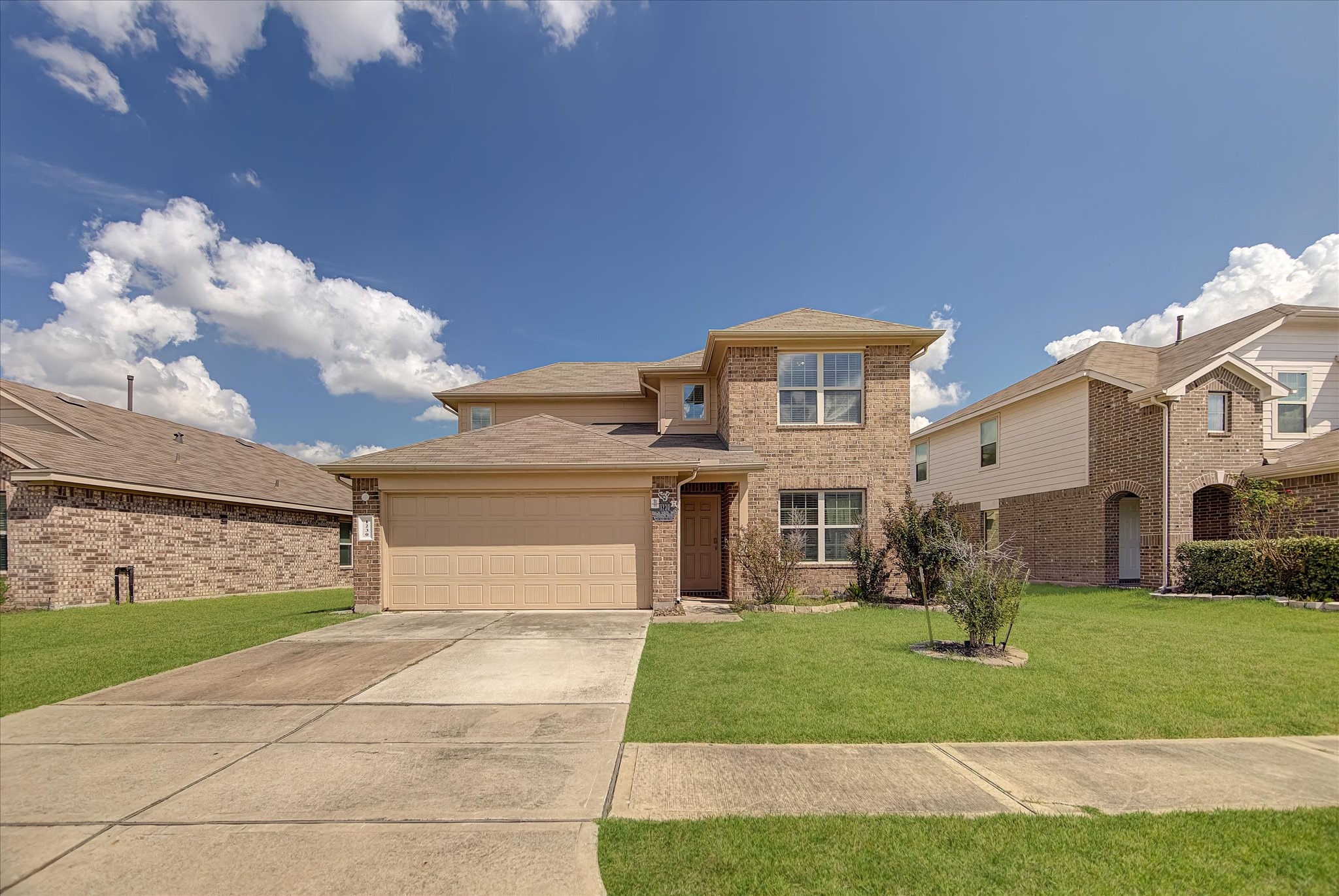 1230 Baja Vista Way Channelview, TX 77530 - Photo 2 of 33 a front view of a house with garden