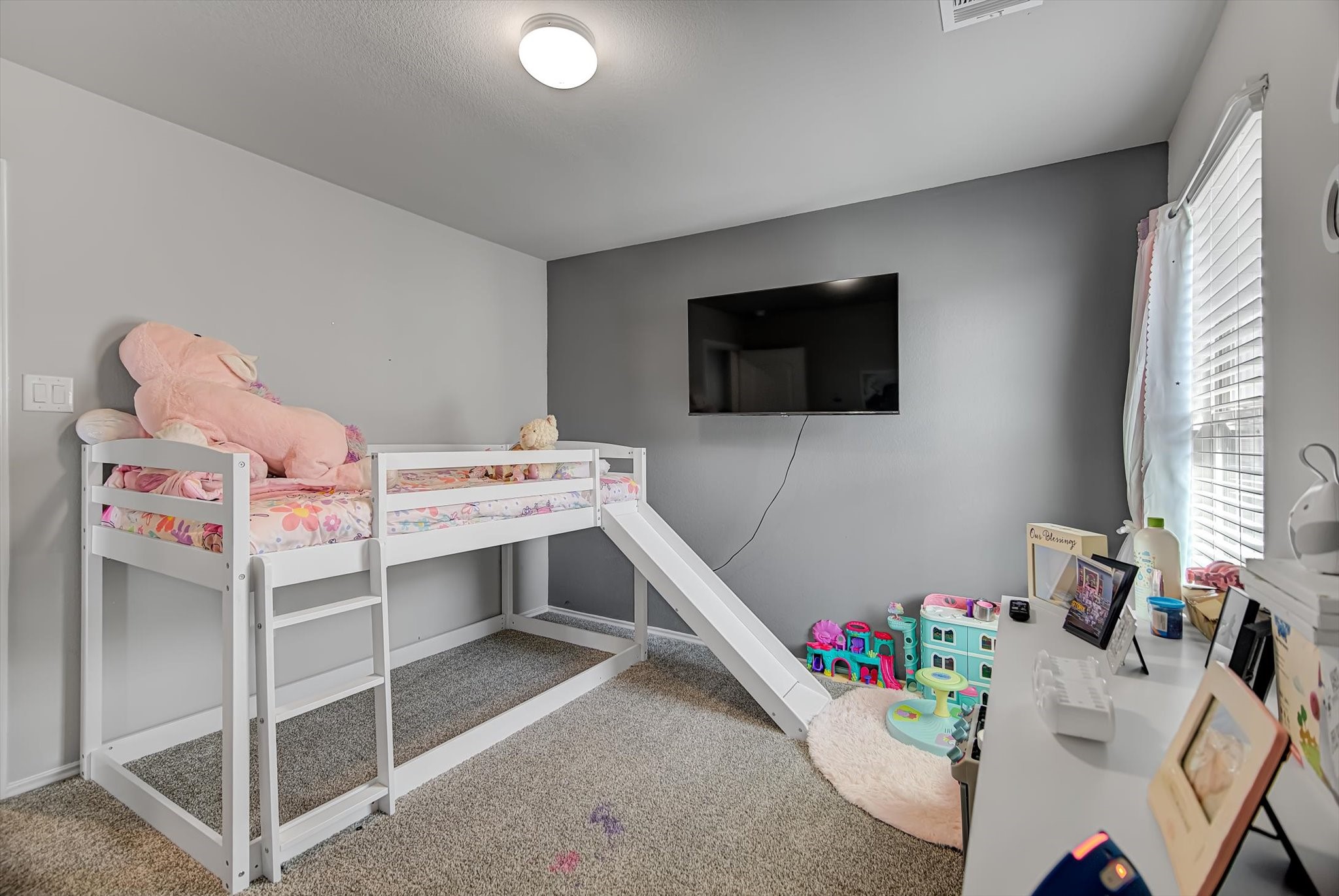 1230 Baja Vista Way Channelview, TX 77530 - Photo 24 of 33 a room with furniture and a flat screen tv