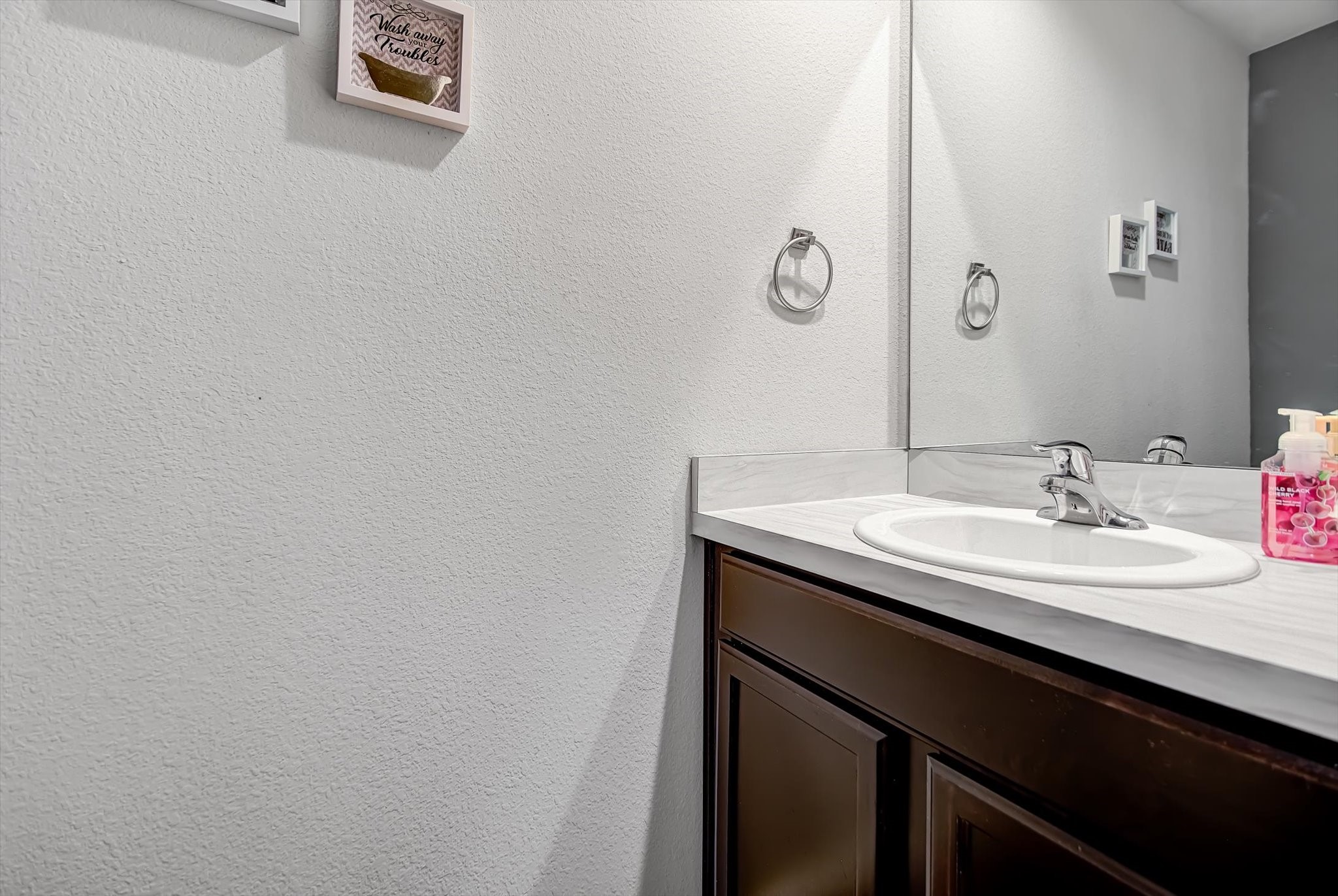 1230 Baja Vista Way Channelview, TX 77530 - Photo 29 of 33 a bathroom with a sink and a mirror