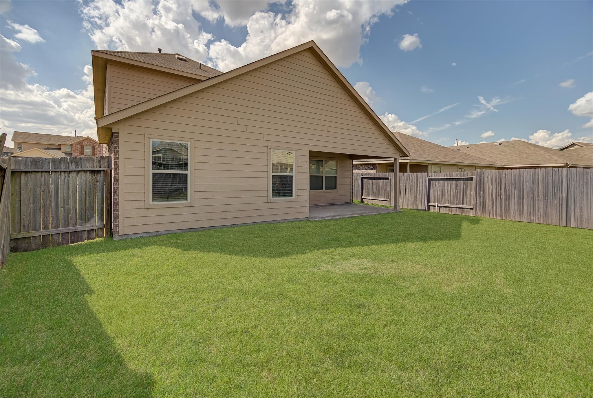 1230 Baja Vista Way Channelview, TX 77530 - Photo 33 of 33 a view of a house with a backyard