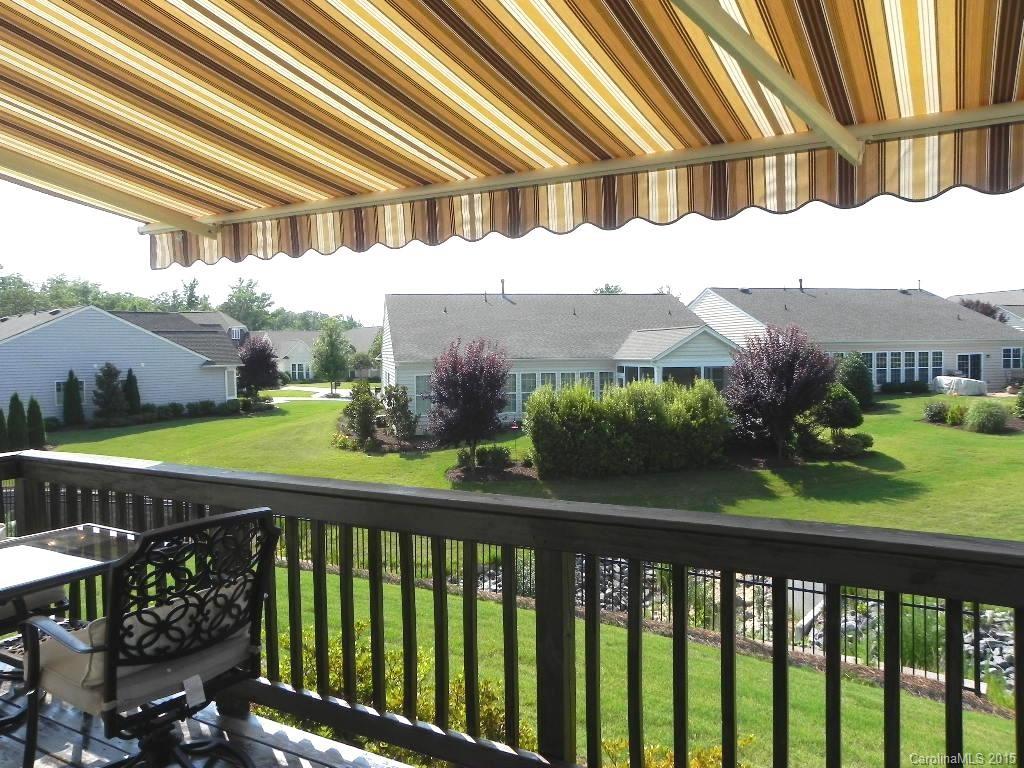 3030 Voyageurs Way Indian Land, SC 29707 - Photo 12 of 12 a view of a house with a yard and potted plants